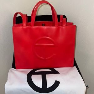 Medium Red Telfar Shopping Bag with Duster Bag.